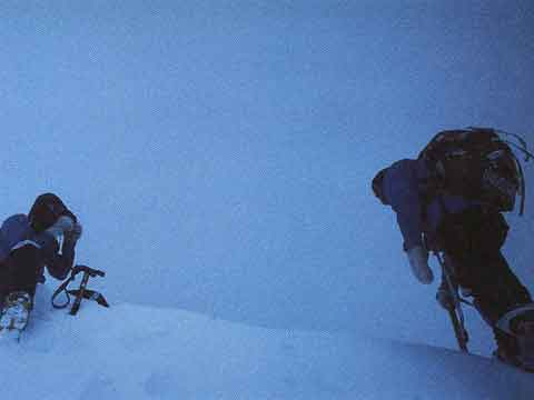 
Reinhold Messner photographs Sher Khan and Nazir Sabir on Gasherbrum II Summit July 24, 1982 - G I und G II Herausforderung Gasherbrum book 
